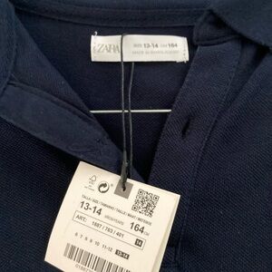 New shirt color blue,size 13-14 .zara brand,long sleeve.